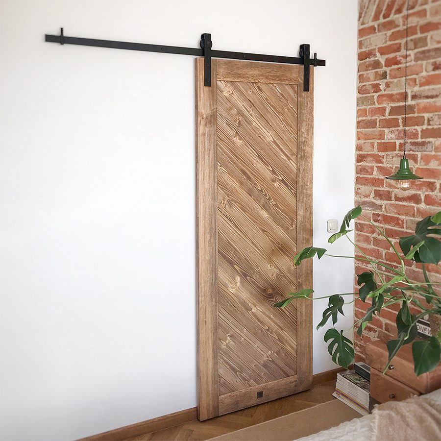 wooden sliding door, wardrobe door, bedroom dressing room, sliding wardrobe door, wooden door, brick in the bedroom, hanging bedside lamp, vintage style, vintage bedroom