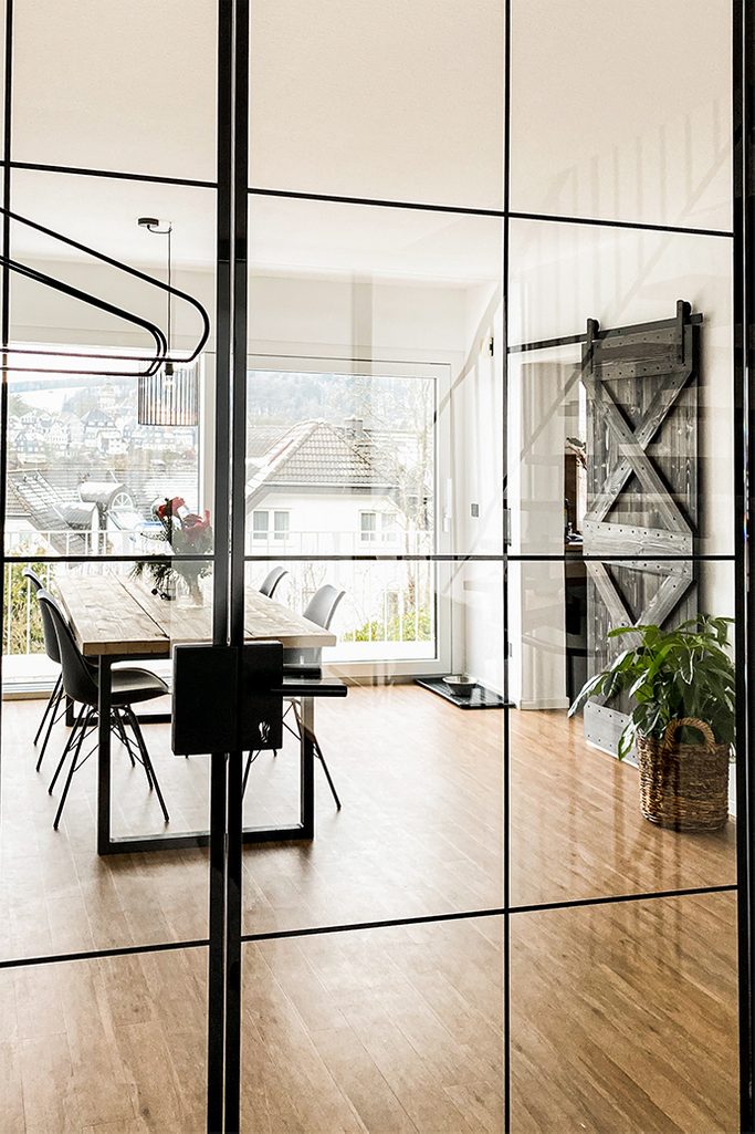 Wood And Metal In The Dining Room With Sliding Doors Reno Dining Room With Sliding Doors Reno