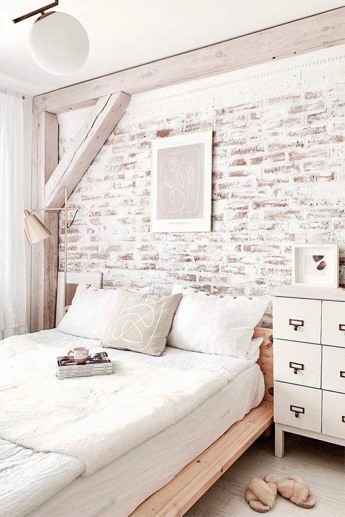 white bedroom design, white decor in bedroom, brick wall painted in white, brick wall in bedroom, brick and wood