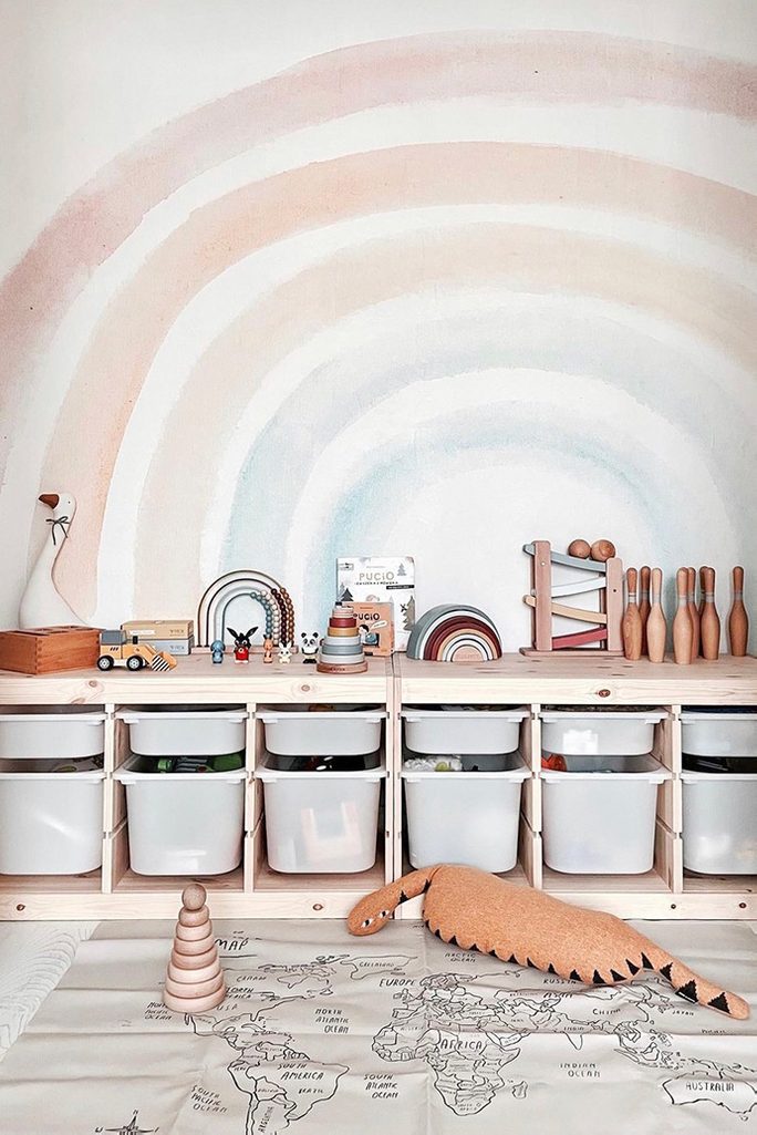 white bedroom design, rainbow decor in children corner , wooden toys, storage for children toys,